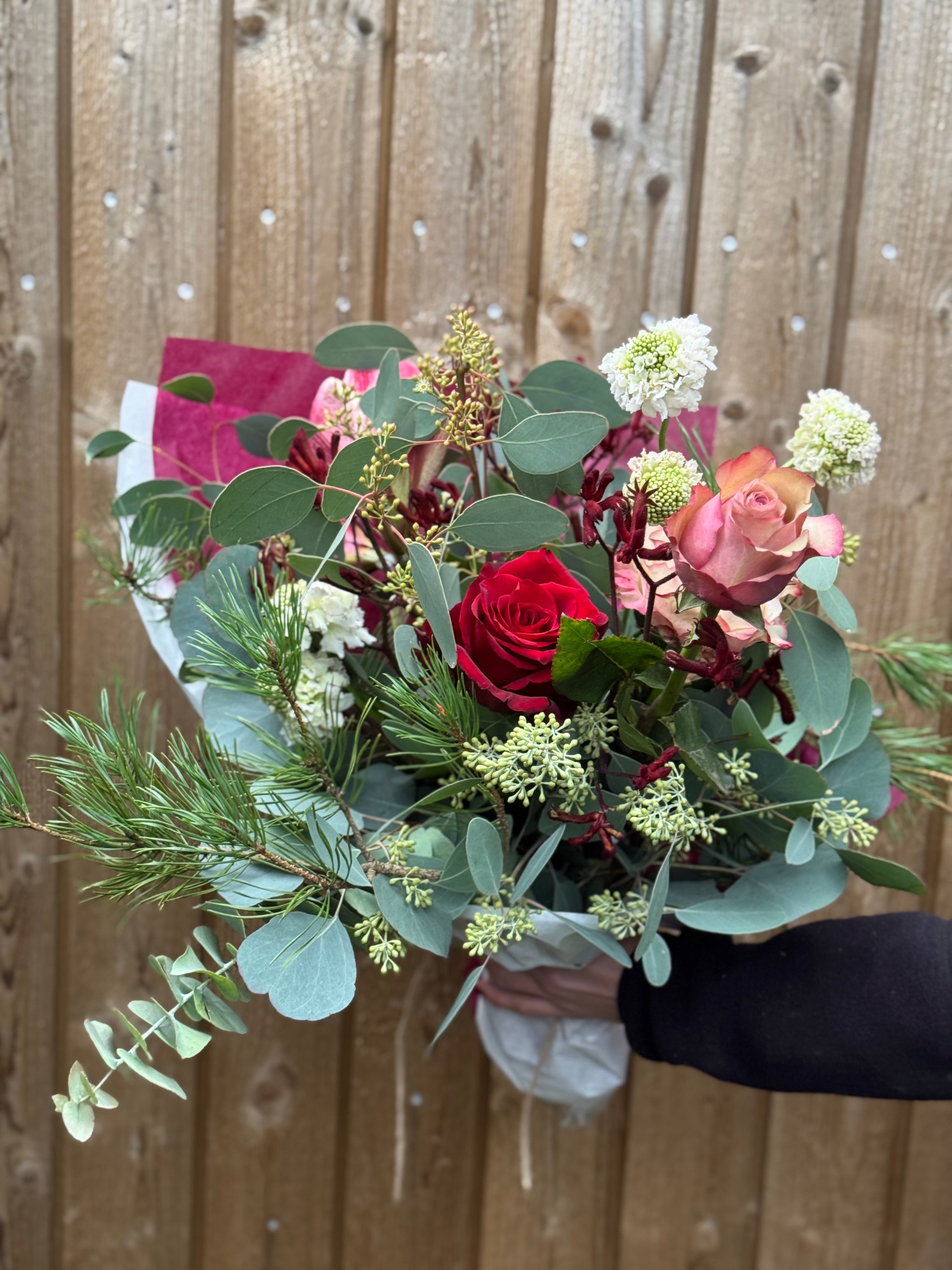 Julebuket med kun lidt rødt